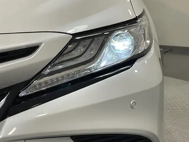 トヨタ カムリ WSレザーパッケージ 愛知県 2020(令2)年 2.5万km プラチナホワイトパールマイカ 純正8インチナビ/（Bluetooth/AM/FM/フルセグTV/Carplay）/衝突軽減ブレーキ/レーダークルーズコントロール/シートヒーター/パワーシート/LEDヘッドライト/オートマチックハイビーム/ETC/バックカメラ/ドライブレコーダー/コーナーセンサー/スマートキー/純正18インチAW/レーンキープアシスト/横滑り防止装置