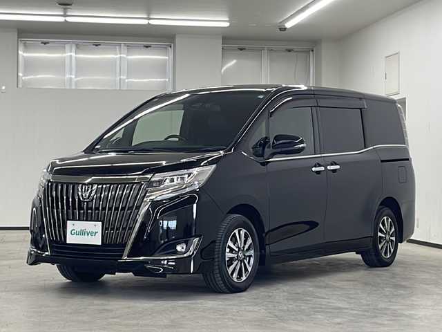 トヨタ エスクァイア Gi プレミアムパッケージ ブラックテーラード 長崎県 2019(令1)年 7.4万km 黒 社外11インチナビ（アルパイン　EX11Z）/両側パワースライドドア/バックカメラ/フルセグTV/Bluetooth/ドライブレコーダー/ETC/LEDヘッドランプ/衝突軽減システム/コーナーセンサー/レーンキープアシスト/ステアリングヒーター/オートライト/オートハイビーム/ハーフレザーシート/シートヒーター/純正フロアマット/スマートキー/USBポート×２/取扱説明書