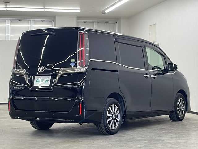 トヨタ エスクァイア Gi プレミアムパッケージ ブラックテーラード 長崎県 2019(令1)年 7.4万km 黒 社外11インチナビ（アルパイン　EX11Z）/両側パワースライドドア/バックカメラ/フルセグTV/Bluetooth/ドライブレコーダー/ETC/LEDヘッドランプ/衝突軽減システム/コーナーセンサー/レーンキープアシスト/ステアリングヒーター/オートライト/オートハイビーム/ハーフレザーシート/シートヒーター/純正フロアマット/スマートキー/USBポート×２/取扱説明書