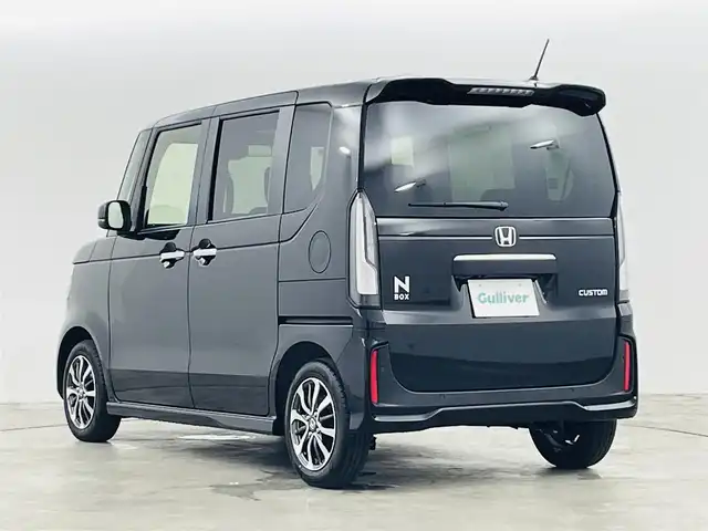 ホンダ Ｎ ＢＯＸ カスタム 福島県 2025(令7)年 0.1万km クリスタルブラックパール ホンダセンシング　/・衝突軽減ブレーキ（CMBS）/・先行車発進お知らせ機能/・歩行者事故低減ステアリング/・路外逸脱抑制機能/・標識認識機能/・渋滞追従機能付アダプティブクルーズコントロール（ACC）/・車線維持支援システム（LKAS）/・誤発進抑制機能/・後方誤発進抑制機能/・近距離衝突軽減ブレーキ/・急アクセル抑制機能/・パーキングセンサーシステム/・オートハイビーム/両側パワースライドドア　/シーヒーター　/電子パーキング　/・ブレーキホールド　/オートライト　/・ＬＥＤライト　/ヘッドライトレベライザー　/プッシュスタート　/・スマートキー　/ステアリングスイッチ/・革巻きステアリング/・チルトステアリング/電動格納ミラー/・ベンチシート/保証書