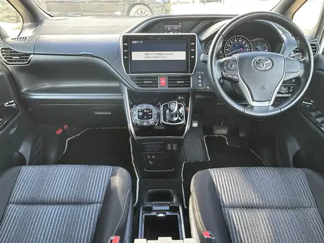 トヨタ ヴォクシー ハイブリッド ZS 煌Ⅱ 大阪府 2020(令2)年 6.3万km ホワイトパールクリスタルシャイン 純正１０インチナビ　/   フルセグＴＶ/CD/DVD/Bluetooth/USB　/バックモニター　/衝突軽減ブレーキ/リアコーナーセンサー/パーキングアシスト　/前席シートヒーター　/両側パワースライドドア/クルーズコントロール/レーンキープアシスト　/アイドリングストップ/オートマチックハイビーム　/前方ドライブレコーダー/純正16インチアルミホイール/プッシュスタート　/純正フロアマット/スマートキー　/ＥＴＣ　/ＬＥＤ