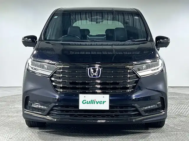ホンダ オデッセイ ハイブリッド e:HEVアブソルート EXブラックED 神奈川県 2023(令5)年 3万km プレミアムヴィーナスブラックP 純正11.4型メモリーナビゲーション【LXM-247VFLi】/フルセグ　CD DVD　SD　USB　Bluetooth　HDMI　/マルチビューカメラ/両側電動スライドドア/パワーバックドア/ホンダセンシング/近距離衝突軽減ブレーキ/オートハイビーム/急アクセル抑制機能/衝突軽減ブレーキ/誤発進抑制機能/先行車発進お知らせ機能/アダブティブクルーズコントロール/レーンキープアシストシステム/LKAS車線維持支援システム/路外逸脱抑制機能/ブラインドスポットインフォメーション/踏み間違い衝突軽減システム/前後パーキングセンサー/革巻きステアリング/パドルシフト/本革シート/前席パワーシート/前席/後席左右シートヒーター/2列目電動オットマンシート/ECON/SPORT/ECO/EVモード/純正前後ドライブレコーダー/純正ビルトインETC/ワイヤレス充電/電動パーキングブレーキ/オートブレーキホールド/プッシュスタート/スマートキー/LEDヘッドランプ/LEDシーケンシャルターンランプ/オートライト/純正18インチアルミホイール