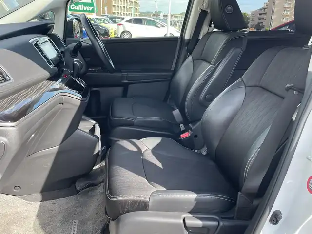 ホンダ オデッセイ ハイブリッド アブソルートセンシングアドバンP 東京都 2016(平28)年 4.9万km ホワイトオーキッドパール ホンダセンシング/衝突軽減ブレーキ/アダプティブクルーズコントロール/メーカーナビ/CD/DVD/BT/AM/FM/USB/HDMI/AppleCarplay/マルチビューモニター/両側パワースライドドア/運転席パワーシート（8ウェイ）/ハーフレザーシート/2列目サンシェード/ビルトインETC/LEDヘッドライト