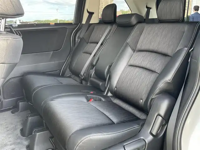 ホンダ オデッセイ ハイブリッド アブソルートセンシングアドバンP 東京都 2016(平28)年 4.9万km ホワイトオーキッドパール ホンダセンシング/衝突軽減ブレーキ/アダプティブクルーズコントロール/メーカーナビ/CD/DVD/BT/AM/FM/USB/HDMI/AppleCarplay/マルチビューモニター/両側パワースライドドア/運転席パワーシート（8ウェイ）/ハーフレザーシート/2列目サンシェード/ビルトインETC/LEDヘッドライト