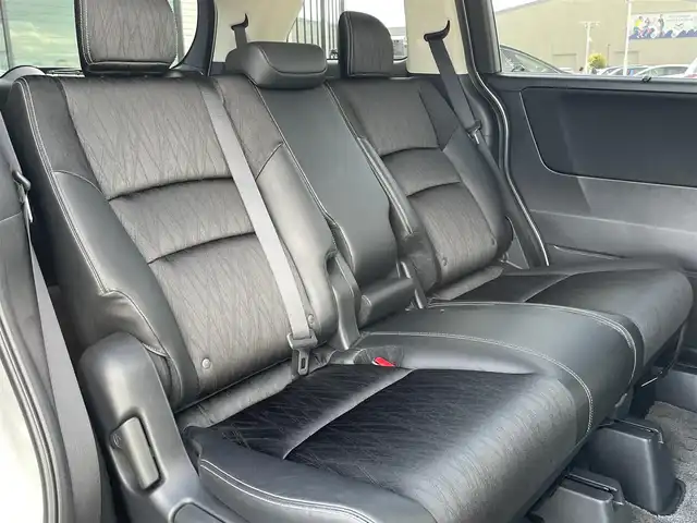 ホンダ オデッセイ ハイブリッド アブソルートセンシングアドバンP 東京都 2016(平28)年 4.9万km ホワイトオーキッドパール ホンダセンシング/衝突軽減ブレーキ/アダプティブクルーズコントロール/メーカーナビ/CD/DVD/BT/AM/FM/USB/HDMI/AppleCarplay/マルチビューモニター/両側パワースライドドア/運転席パワーシート（8ウェイ）/ハーフレザーシート/2列目サンシェード/ビルトインETC/LEDヘッドライト