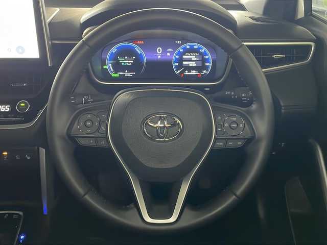 トヨタ カローラ クロス ハイブリッド Z 広島県 2024(令6)年 0.4万km プラチナホワイトパールマイカ 禁煙車/純正10.5型ディスプレイオーディオ/全周囲カメラ/シートヒーター/電動リアゲート/パーキングアシスト/レーダークルーズコントロール/ドラレコ/ＥＴＣ２．０/パワーシート/ブラインドスポットモニター/オートマチックハイビーム/エアバッグ(運転席/助手席/サイド/カーテン)/純正18インチアルミホイール(225/50/R18)