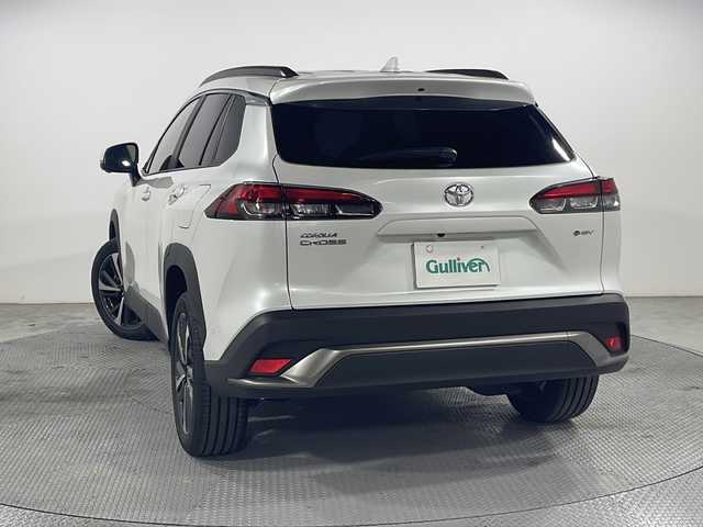 トヨタ カローラ クロス ハイブリッド Z 広島県 2024(令6)年 0.4万km プラチナホワイトパールマイカ 禁煙車/純正10.5型ディスプレイオーディオ/全周囲カメラ/シートヒーター/電動リアゲート/パーキングアシスト/レーダークルーズコントロール/ドラレコ/ＥＴＣ２．０/パワーシート/ブラインドスポットモニター/オートマチックハイビーム/エアバッグ(運転席/助手席/サイド/カーテン)/純正18インチアルミホイール(225/50/R18)