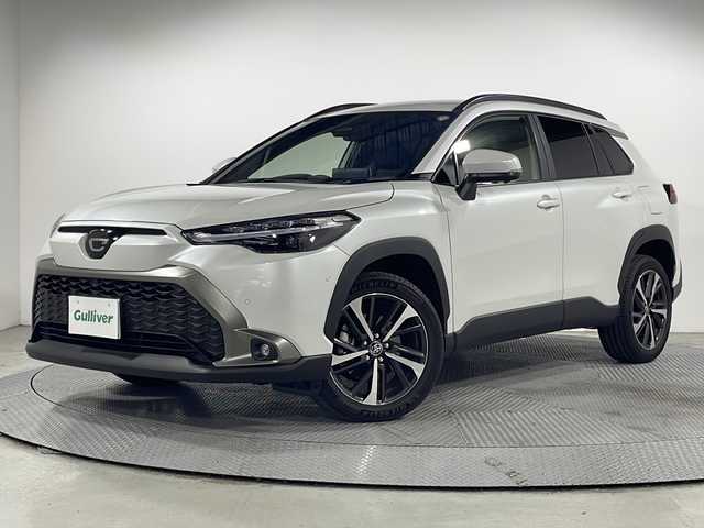 トヨタ カローラ クロス ハイブリッド Z 広島県 2024(令6)年 0.4万km プラチナホワイトパールマイカ 禁煙車/純正10.5型ディスプレイオーディオ/全周囲カメラ/シートヒーター/電動リアゲート/パーキングアシスト/レーダークルーズコントロール/ドラレコ/ＥＴＣ２．０/パワーシート/ブラインドスポットモニター/オートマチックハイビーム/エアバッグ(運転席/助手席/サイド/カーテン)/純正18インチアルミホイール(225/50/R18)