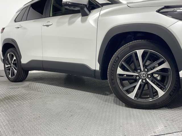 トヨタ カローラ クロス ハイブリッド Z 広島県 2024(令6)年 0.4万km プラチナホワイトパールマイカ 禁煙車/純正10.5型ディスプレイオーディオ/全周囲カメラ/シートヒーター/電動リアゲート/パーキングアシスト/レーダークルーズコントロール/ドラレコ/ＥＴＣ２．０/パワーシート/ブラインドスポットモニター/オートマチックハイビーム/エアバッグ(運転席/助手席/サイド/カーテン)/純正18インチアルミホイール(225/50/R18)