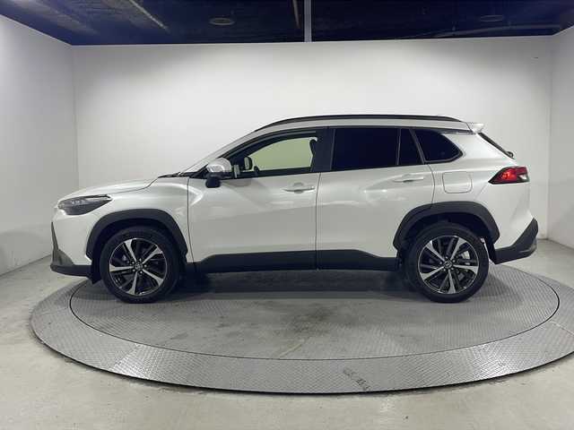 トヨタ カローラ クロス ハイブリッド Z 広島県 2024(令6)年 0.4万km プラチナホワイトパールマイカ 禁煙車/純正10.5型ディスプレイオーディオ/全周囲カメラ/シートヒーター/電動リアゲート/パーキングアシスト/レーダークルーズコントロール/ドラレコ/ＥＴＣ２．０/パワーシート/ブラインドスポットモニター/オートマチックハイビーム/エアバッグ(運転席/助手席/サイド/カーテン)/純正18インチアルミホイール(225/50/R18)