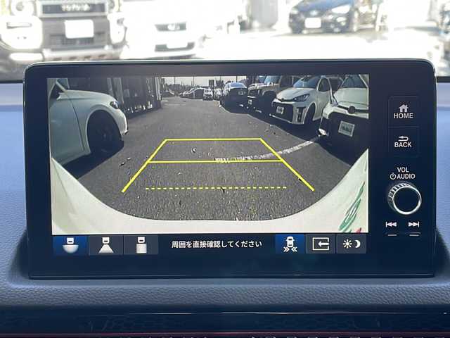 ホンダ シビック RS 大阪府 2025(令7)年 0.1千km プラチナホワイトパール OPフロントバンパーガーニッシュ/OPテールゲートスポイラー（ウイングタイプ）/ホンダセンシング/・衝突軽減ブレーキ/・近距離衝突軽減ブレーキ/・歩行者事故低減ステアリング/・路外逸脱抑制機能/・渋滞追従機能付アダプティブクルーズコントロール/・車線維持支援システム/・先行車発進お知らせ機能/・標識認識機能/・オートハイビーム/・アダプティブドライビングビーム/・パーキングセンサーシステム/・ブラインドスポットインフォメーション/・後退出庫サポート/BOSEプレミアムサウンドシステム/９型ホンダコネクトディスプレイ/【Bluetooth/USB/スマホ連携】/バックカメラ/ビルトインETC2.0/ワイヤレス充電/ハーフレザーシート/D/N席パワーシート/D/N席シートヒーター/オートライト/フルLEDヘッドランプ/18インチ純正AW/取説/保証書/スマートキー/スペアキー