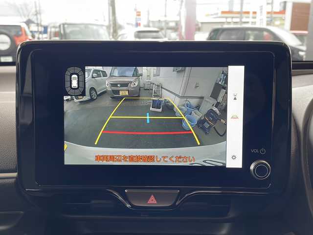 トヨタ ヤリス ハイブリッド Z 秋田県 2024(令6)年 1.1万km プラチナホワイトパールマイカ ワンオーナー/寒冷地仕様/純正8インチディスプレイオーディオ/ナビ　Bluetooth　USB　HDMI　ラジオ　DTV　Miracast/パノラミックビューモニター /レーントレーシングアシスト/LEDヘッドライト/前席シートヒーター/ハーフレザーシート/純正フロアマット/ビルトインETC/レーダークルーズコントロール/ドライブレコーダー前後タイプ/オートライト/オートハイビーム/ステアリングヒーター/ヘッドアップディスプレイ/ステアリングリモコン/プリクラッシュセーフティー/アイドリングストップ/プッシュスタート/スマートキー