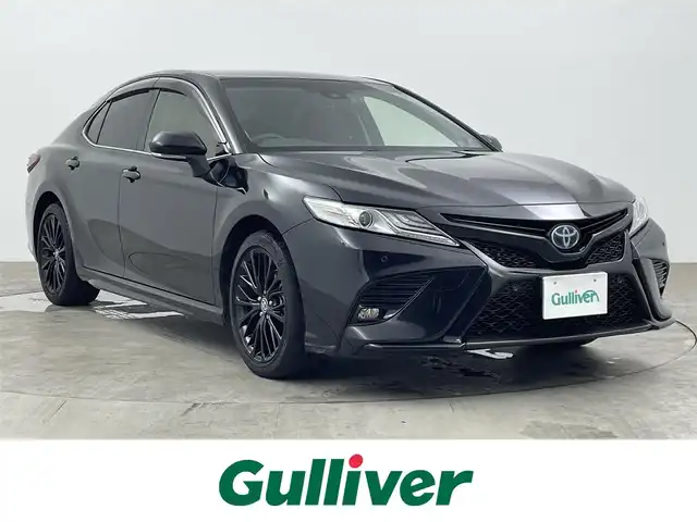 トヨタ カムリ WSレザーパッケージ 大分県 2020(令2)年 4.5万km プレシャスブラックパール 8インチディスプレイオーディオ/JBLサラウンドシステム（9スピーカー）/TV(フルセグ)/BT/USB/AM/FM/Apple Car Play/Android Auto/社外HDMI入力/バックカメラ/前席シートヒーター/パワーシート/Toyota Safety Sense/・プリクラッシュセーフティ（単眼カメラ＋ミリ波レーダー）/・レーンデパーチャーアラート（ステアリング制御機能付き）/・オートマチックハイビーム/・レーダークルーズコントロール（全車速追従機能付）/インテリジェントクリアランスソナー/ブラインドスポットモニター/リアクロストラフィックオートブレーキ/前後ドライブレコーダー：TZ-205W/ビルトインETC2.0/ブラックエディション特別装飾/・プレシャスブラックパール＜219＞/・本革レザーシート（赤革）/・ブラック塗装純正18インチAW/・フロントロアグリルモールディング（スモーク調）/・LEDヘッドライト（スモークエクステンション）/・リアコンビネートランプ（スモークエクステンション）/・フロントカップホルダーリング（サテンメッキ仕様）/ドアバイザー/純正フロアマット/スペアキー