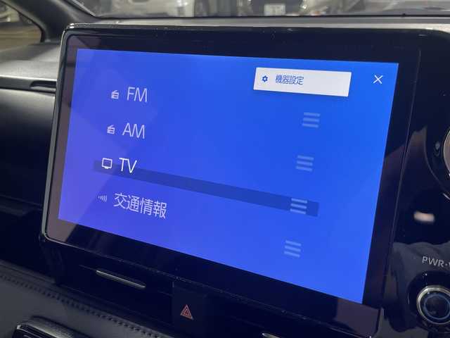 トヨタ ヴォクシー ハイブリッド S－Z 大阪府 2023(令5)年 1万km アティチュードブラックマイカ 登録時9852Km/ナビ　/ドラレコ　/レーダークルコン　/後席モニター　/バックカメラ　/両側パワースライド　/電動リアゲート　/クリアランスソナー　/ＬＥＤオートライト　/オートハイビーム　/アイドリングストップ/シートヒーター　/車線逸脱警報　/ハーフレザー/オットマン