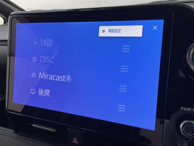 トヨタ ヴォクシー ハイブリッド S－Z 大阪府 2023(令5)年 1万km アティチュードブラックマイカ 登録時9852Km/ナビ　/ドラレコ　/レーダークルコン　/後席モニター　/バックカメラ　/両側パワースライド　/電動リアゲート　/クリアランスソナー　/ＬＥＤオートライト　/オートハイビーム　/アイドリングストップ/シートヒーター　/車線逸脱警報　/ハーフレザー/オットマン