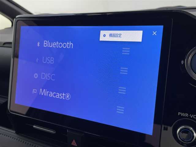 トヨタ ヴォクシー ハイブリッド S－Z 大阪府 2023(令5)年 1万km アティチュードブラックマイカ 登録時9852Km/ナビ　/ドラレコ　/レーダークルコン　/後席モニター　/バックカメラ　/両側パワースライド　/電動リアゲート　/クリアランスソナー　/ＬＥＤオートライト　/オートハイビーム　/アイドリングストップ/シートヒーター　/車線逸脱警報　/ハーフレザー/オットマン