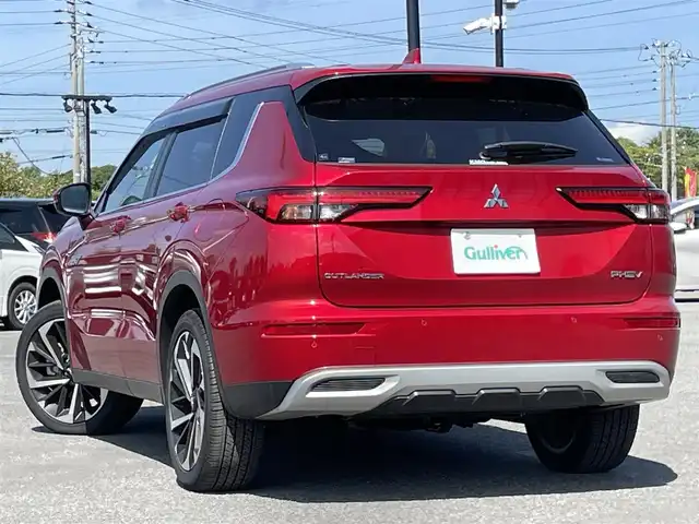 三菱 アウトランダー ＰＨＥＶ G 道央・札幌 2024(令6)年 0.3万km レッドダイヤモンド ４WD/プラグインハイブリッド/寒冷地仕様/純正メーカーナビ/AM/FM/BT/フルセグ/マイパイロット/衝突被害軽減ブレーキ/横滑り防止装置/アダプティブクルーズコントロール/レーンキープアシスト/パーキングセンサー/ブラインドスポットモニター/アラウンドビューモニター/ビルトインETC2.0/自動防眩ミラー/EVMODE/DRIVEMODE切替/パワーバックドア/D席パワーシート/前席シートヒーター/ハーフレザーシート/革巻きステアリング/ステアリングリモコン/パドルシフト/ハンドルヒーター/AC1500W/電動パーキング/オートブレーキホールド/置くだけ充電/プッシュスタート/スマートキー/LEDヘッドライト/オートライト/オートハイビーム/フォグランプ/電動格納ミラー/ウィンカーミラー/純正フロアマット/ドアバイザー/スペアキー