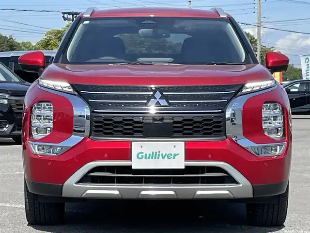三菱 アウトランダー ＰＨＥＶ G 道央・札幌 2024(令6)年 0.3万km レッドダイヤモンド ４WD/プラグインハイブリッド/寒冷地仕様/純正メーカーナビ/AM/FM/BT/フルセグ/マイパイロット/衝突被害軽減ブレーキ/横滑り防止装置/アダプティブクルーズコントロール/レーンキープアシスト/パーキングセンサー/ブラインドスポットモニター/アラウンドビューモニター/ビルトインETC2.0/自動防眩ミラー/EVMODE/DRIVEMODE切替/パワーバックドア/D席パワーシート/前席シートヒーター/ハーフレザーシート/革巻きステアリング/ステアリングリモコン/パドルシフト/ハンドルヒーター/AC1500W/電動パーキング/オートブレーキホールド/置くだけ充電/プッシュスタート/スマートキー/LEDヘッドライト/オートライト/オートハイビーム/フォグランプ/電動格納ミラー/ウィンカーミラー/純正フロアマット/ドアバイザー/スペアキー
