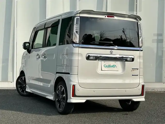 スズキ スペーシア カスタム HYBRID XS ターボ 福岡県 2022(令4)年 2.5万km ピュアホワイトP Panasonic8インチナビ/（CD/DVD/TV/AM/FM/Bluetooth）/全方位カメラ/バックカメラ/両側パワースライドドア/ヘッドアップディスプレイ/サーキュレーター/シートヒーターD席/ETC/後席サンシェード/レーダークルーズコントロール/純正15インチアルミホイール/パドルシフト/後席テーブル/クリアランスソナー/プリクラッシュ/レーンキープアリスト/横滑り防止装置/アイドリングストップ/LEDヘッドライト/ISOFIX/ドアバイザー/ステアリングスイッチ/電格ミラー/フォグランプ/スマートキー/スペアキー