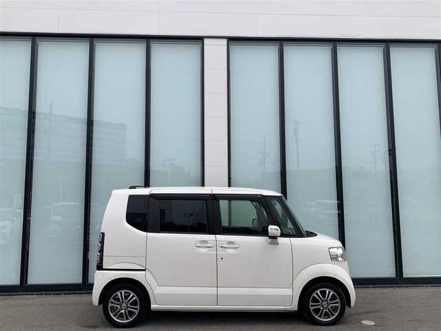 ホンダ Ｎ ＢＯＸ SSパッケージ 大阪府 2015(平27)年 5.6万km プレミアムホワイトパール あんしんパッケージ/・シティブレーキアクティブシステム/・前席用i-サイドエアバッグシステム〈容量変化タイプ〉/・サイドカーテンエアバッグシステム〈前席/後席対応〉）/純正メモリナビ/   TV/CD/DVD/Bluetooth/バックカメラ/両側パワースライドドア/純正14インチアルミホイール/アイドリングストップ/プッシュスタート/スマートキー/横滑り防止装置/ETC /ステアリングスイッチ/純正フロアマット