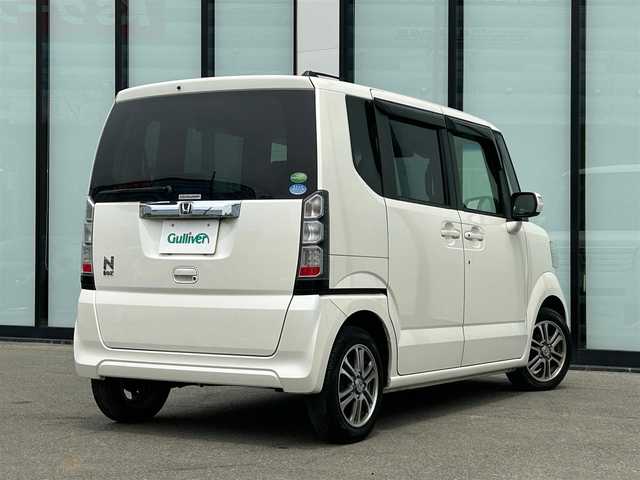 ホンダ Ｎ ＢＯＸ SSパッケージ 大阪府 2015(平27)年 5.6万km プレミアムホワイトパール あんしんパッケージ/・シティブレーキアクティブシステム/・前席用i-サイドエアバッグシステム〈容量変化タイプ〉/・サイドカーテンエアバッグシステム〈前席/後席対応〉）/純正メモリナビ/   TV/CD/DVD/Bluetooth/バックカメラ/両側パワースライドドア/純正14インチアルミホイール/アイドリングストップ/プッシュスタート/スマートキー/横滑り防止装置/ETC /ステアリングスイッチ/純正フロアマット