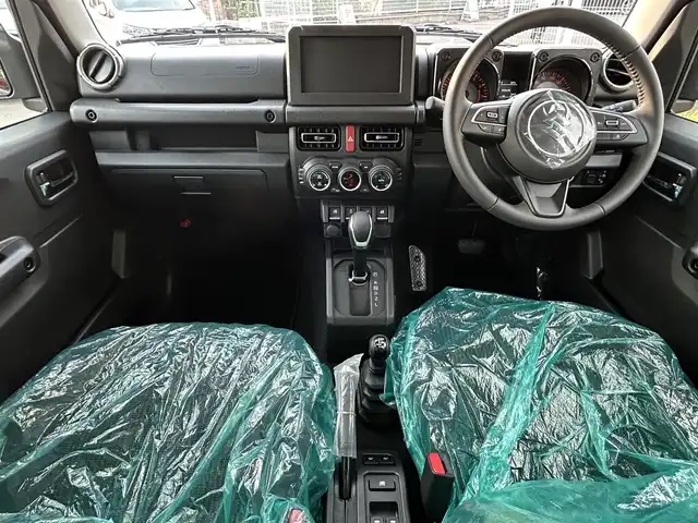 スズキ ジムニー ノマド FC 愛知県 2025(令7)年 0.1万km未満 黒 登録済未使用者/4WD/スズキセーフティサポート/デュアルブレーキサポート/・誤発進抑制機能/・ふらつき警報機能/・標識認識機能/・先行車発進お知らせ機能/・レーダークルーズコントロール/前席シートヒーター/純正フロアマット/LEDヘッドライト/ドアミラーヒーター/スマートキー/プッシュスタート/取説、保証書/スペアキー
