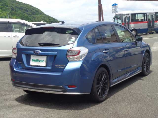 スバル インプレッサ スポーツ HV 2．0i-S アイサイト 鹿児島県 2015(平27)年 11.4万km クォーツブルーP ワンオーナー/衝突被害軽減システム/レーダークルーズコントロール/パドルシフト/AVIC-910DVD/　 Bluetooth DVD再生可能　バックカメラ/純正ドライブレコーダー/HIDヘッドライト/スマートキー×2/新車保証書　取説有り/純正アルミ/　