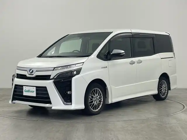 トヨタ ヴォクシー ハイブリッド ZS 煌 群馬県 2018(平30)年 4.7万km ホワイトパールクリスタルシャイン 純正９型ナビ　純正１２．１型後席モニター　バックカメラ　衝突被害軽減ブレーキ　　オートマチックハイビーム　シートヒーター　両側パワースライドドア　ドライブレコーダー　ＥＴＣ　クルーズコントロール