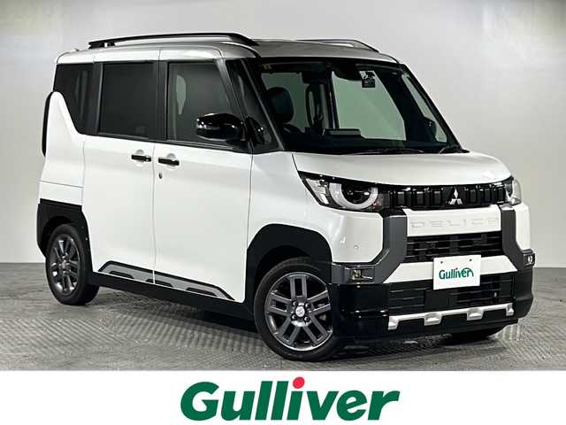 三菱 デリカミニ G プレミアム 沖縄県 2023(令5)年 1.9万km アメジストブラック/シルキーホワイト 県外仕入　/禁煙車　/純正ナビ[MM222D-LM]/（フルセグＴＶ　Blｕｅｔｏｏｔｈ FM AM）　/全方位カメラ　/両側パワースライドドア　/E‐Assist/・衝突被害軽減ブレーキ/・ 車線逸脱警報機能/・レーダークルーズコントロール/マイパイロット　/スマートルームミラー/シートバックテーブル/ＥＴＣ　/ダウンヒルアシストコントロール　/カーテンエアバック/LEDヘッドライト/ステアリングスイッチ/電動パーキングブレーキ