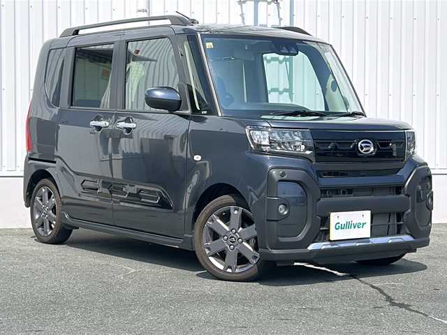 ダイハツ タント ファンクロスターボ 三重県 2023(令5)年 1.8万km クロムグレーメタリック 社外ナビ/両側パワースライドドア/スペアキー/前席シートヒーター/コーナーセンサー/革巻きハンドル/電子パーキング/USB給電/リヤサンシェード/オートハイビーム/オートライト/純正フロアマット/電動格納ミラー/禁煙車