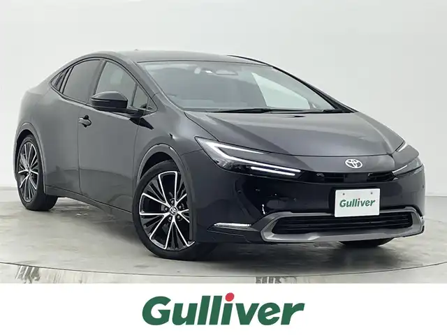 トヨタ プリウス Z 宮城県 2023(令5)年 1.9万km アティチュードブラックマイカ ワンオーナー/寒冷地仕様/ワイパーデアイサー/パノラマルーフ/純正12型ナビ(AM/FM/BT/TV/USB/Miracast)/デジタルインナーミラー/全方位カメラ/ビルトインETC2.0/トヨタセーフティーセンス/レーダークルーズコントロール/BSM/100V電源/パワーバックドア/パワーシート/シートメモリー/シートヒーター/エアシート/ステアリングヒーター/オートライト/オートマチックハイビーム/LEDヘッドライト/純正フロアマット/純正19インチアルミホイール