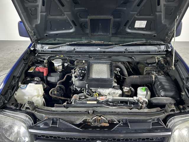 スズキ ジムニー XG 沖縄県 2012(平24)年 3.2万km ノクターンブルーパール 禁煙車/４ＷＤ/ワンオーナー/社外オーディオ/ＣＤ／ラジオ　/リモコンキー/ターボ/背面タイヤ/純正フロアマット/純正ドアバイザー/フェンダーミラー/横滑り防止装置/スペアキー/取扱説明書/保証書