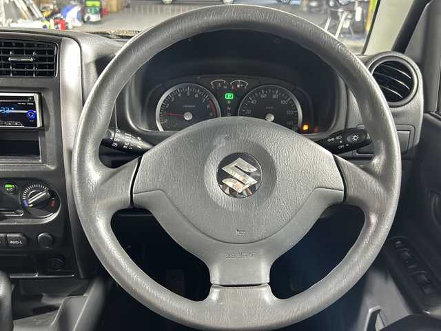 スズキ ジムニー XG 沖縄県 2012(平24)年 3.2万km ノクターンブルーパール 禁煙車/４ＷＤ/ワンオーナー/社外オーディオ/ＣＤ／ラジオ　/リモコンキー/ターボ/背面タイヤ/純正フロアマット/純正ドアバイザー/フェンダーミラー/横滑り防止装置/スペアキー/取扱説明書/保証書