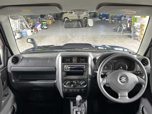 スズキ ジムニー XG 沖縄県 2012(平24)年 3.2万km ノクターンブルーパール 禁煙車/４ＷＤ/ワンオーナー/社外オーディオ/ＣＤ／ラジオ　/リモコンキー/ターボ/背面タイヤ/純正フロアマット/純正ドアバイザー/フェンダーミラー/横滑り防止装置/スペアキー/取扱説明書/保証書