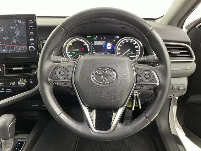 トヨタ カムリ WS 埼玉県 2022(令4)年 2.6万km プラチナホワイトパールマイカ 純正ナビ　/　(フルセグ・AM・FM・Bluetooth)　/ＥＴＣ２．０　/バックカメラ　/トヨタセーフティセンス　/ロードサインアシスト　/プリクラッシュセーフティ　/レーントレーシングアシスト/ブラインドスポットモニター/リヤクロストラフィックアラート/パーキングサポートブレーキ　/先行車発進告知　/クリアランスソナー　/パワーシートＤ席/前後ドライブレコーダー/純正フロアマット/純正アルミホイール１７インチ/前後コーナーセンサー