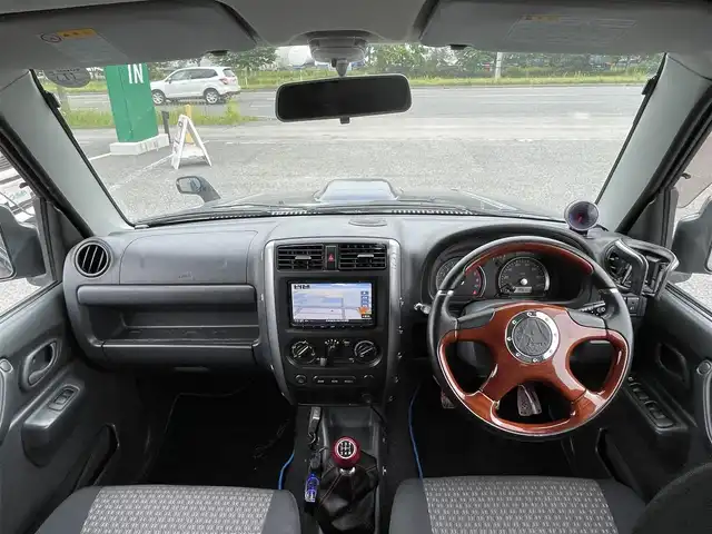 スズキ ジムニー XG 道央・札幌 2011(平23)年 14.6万km ノクターンブルーパール ４WD/5速MT/インチアップ/社外メモリーナビ/CD/DVD/BT/フルセグ/トランスファ切替/HIDヘッドライト/フォグランプ/ヘッドライトレベライザー/社外フロアマット/ドアバイザー/スペアキー/AW付冬タイヤ積込/175/80/R16/2019年/山7mm
