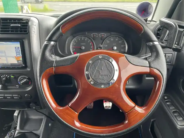 スズキ ジムニー XG 道央・札幌 2011(平23)年 14.6万km ノクターンブルーパール ４WD/5速MT/インチアップ/社外メモリーナビ/CD/DVD/BT/フルセグ/トランスファ切替/HIDヘッドライト/フォグランプ/ヘッドライトレベライザー/社外フロアマット/ドアバイザー/スペアキー/AW付冬タイヤ積込/175/80/R16/2019年/山7mm