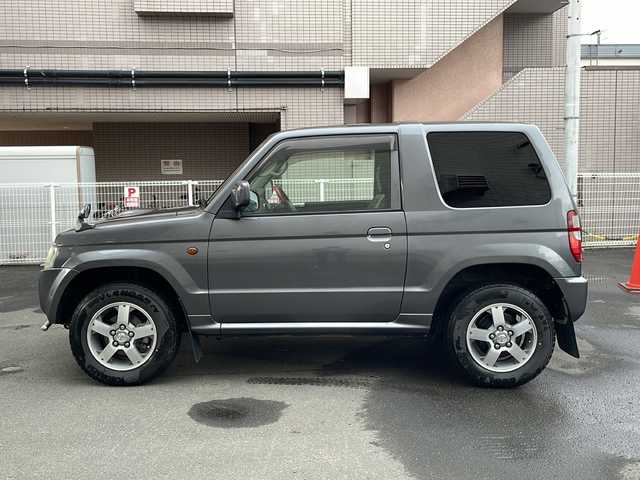 日産 キックス RX 道央・札幌 2009(平21)年 7.2万km ミディアムグレー 社外ナビ(BT、FM、AM、TV、SD、CD)/純正ドアバイザー/シートヒーター(運転席)/ETC/オートライト/純正エンジンスターター/バックカメラ/背面タイヤ