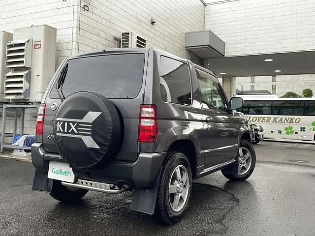 日産 キックス RX 道央・札幌 2009(平21)年 7.2万km ミディアムグレー 社外ナビ(BT、FM、AM、TV、SD、CD)/純正ドアバイザー/シートヒーター(運転席)/ETC/オートライト/純正エンジンスターター/バックカメラ/背面タイヤ