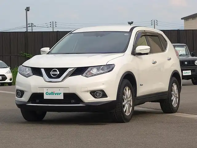 日産 エクストレイル ハイブリッド 20X エマージェンシーブレーキ 山形県 2016(平28)年 7.5万km ブリリアントホワイトパール 4WD/衝突被害軽減システム/純正SDナビ/　　【CD DVD BT フルセグ AUX】/アラウンドビューモニター/電動リアゲート/クルーズコントロール/LEDオートヘッドライト/革調シートカバー/シートヒーター/純正17インチアルミホイール/アイドリングストップ/コーナーセンサー/ステアリングスイッチ/電動格納ウィンカーミラー/フォグランプ/スマートキー/ETC