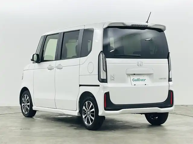 ホンダ Ｎ ＢＯＸ カスタム 福島県 2025(令7)年 0.1千km プラチナホワイトパール 届出済未使用車 /ホンダセンシング/・衝突軽減ブレーキ/・パーキングセンサー/・踏み間違え防止アシスト/・路外逸脱抑制機能/・レーダークルーズコントロール/左側パワースライドドア/電子パーキング/・オートホールド/ステアリングスイッチ/シートヒーター(運転席/助手席)/プッシュスタート/・スマートキー/・スペアキー/LEDヘッドライト/・オートライト/・ヘッドライトレベライザー/電動格納ミラー