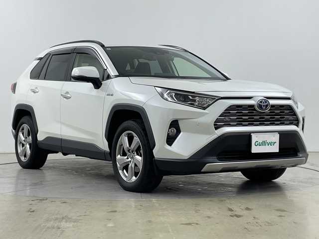 トヨタ ＲＡＶ４ ハイブリットG 道央・札幌 2019(令1)年 10.4万km ホワイトパールクリスタルシャイン ・４WD/ハイブリット/寒冷地仕様/・トヨタセーフティセンス/・プリクラッシュセーフティ/・レーダークルーズコントロール/・ブラインドスポットモニター/・純正9インチディーラーOPナビ/・DVD.CD.SD.Bluetooth/・フルセグTV/バックカメラ /・パワーバックドア /・レザーシート/D席パワーシート/・運転席.助手席シートヒーター/・ステアリングヒーター/・純正エンジンスターター/・LEDライト/オートハイビーム/・前後ドライブレコーダー/・ビルトインETC/・スマートキーX2