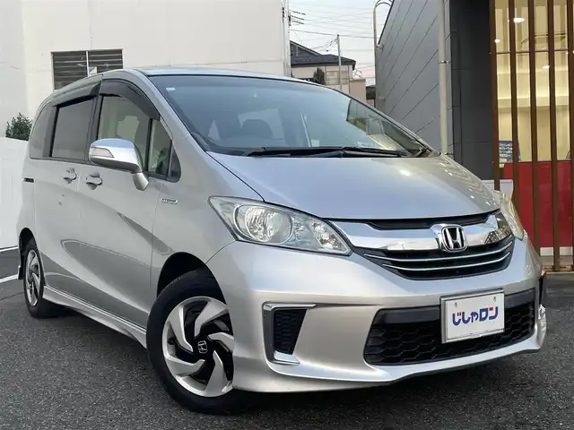 ホンダ フリード ハイブリット ジャストセレクション 千葉県 2015(平27)年 10.2万km スーパープラチナメタリック (株)IDOMが運営する【じしゃロン八千代店】の自社ローン専用車両になります。/こちらは現金またはオートローンご利用時の価格です。自社ローンご希望の方は別途その旨お申付け下さい/両側パワースライドドア/ビルトインETC/Bluetoothオーディオ対応ナビ