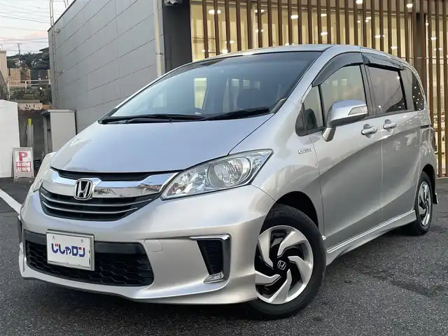 ホンダ フリード ハイブリット ジャストセレクション 千葉県 2015(平27)年 10.2万km スーパープラチナメタリック (株)IDOMが運営する【じしゃロン八千代店】の自社ローン専用車両になります。/こちらは現金またはオートローンご利用時の価格です。自社ローンご希望の方は別途その旨お申付け下さい/両側パワースライドドア/ビルトインETC/Bluetoothオーディオ対応ナビ