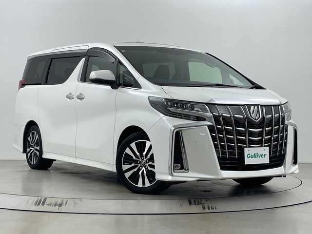 トヨタ アルファード S Cパッケージ 埼玉県 2018(平30)年 5.8万km ホワイトパールクリスタルシャイン サンルーフ/JBLプレミアムサウンド/純正フリップダウンモニター/純正メモリナビ/CD/DVD/Bluetooth/フルセグ/全方位カメラ/デジタルインナーミラー/ドライブレコーダー/ビルトインETC2.0/トヨタセーフティセンス/ブラインドスポットモニター/電子パーキングシステム/ブレーキホールド/両側パワースライドドア/パワーバックドア/ステアリングヒーター/レザーシート/パワーシート/シートヒーター/エアシート/純正１６インチアルミホイール/純正フロアマット/オットマン/プッシュスタート/スマートキー