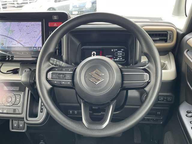 スズキ スペーシア HYBRID X 石川県 2024(令6)年 2万km モスグレーメタリック 禁煙車/デュアルカメラブレーキサポート/純正9インチメモリナビ/　　AM/FM/フルセグ/applecarplay/androidauto/アラウンドビューモニター/両側パワースライドドア/LEDオートライト/ヘッドライトレベライザー/前席シートヒーター/後席オットマン/アイドリングストップ/サーキュレーター/サンシェード/リアテーブル/電動格納ミラー/フロアマット/ドアバイザー/ステアリングスイッチ/スマートキー/ETC
