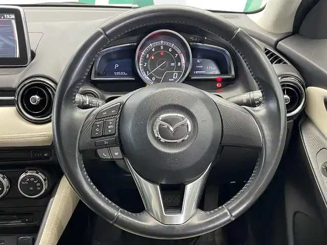 マツダ デミオ 13S ツーリング Lパッケージ 鹿児島県 2016(平28)年 6万km ジェットブラックマイカ 純正ナビ/フルセグTV/BT/CD/DVD/バックカメラ/スマートシティブレーキサポート/ハーフレザーシート/シートヒーター/LEDヘッドライト/ヘッドアップディスプレイ/ドライブレコーダー/ETC/純正アルミホイール/フロアマット/スマートキー