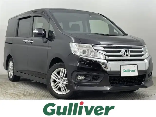 ホンダ ステップワゴン スパーダ Z 道央・札幌 2013(平25)年 6.1万km プレミアムコスミックバイオレットパール ・４WD/・寒冷地仕様/・純正ナビゲーション（VXM-135VFNi）/　ＣＤ/ＤＶＤ/フルセグ/ＳＤ/ＢＴ/・純正ビルトインETC/・バックカメラ/・ヒッチメンバー/・両側パワースライドドア/・横滑り防止装置/・HIDヘッドライト/・オートライト/・パドルシフト/・ミラーヒーター/・ドアバイザー/・ワイパーデアイサー/・スマートキー/・スペアキー1本/・社外フロアマット（前席欠品）/・純正AW16インチ/・保証書あり/・取説あり