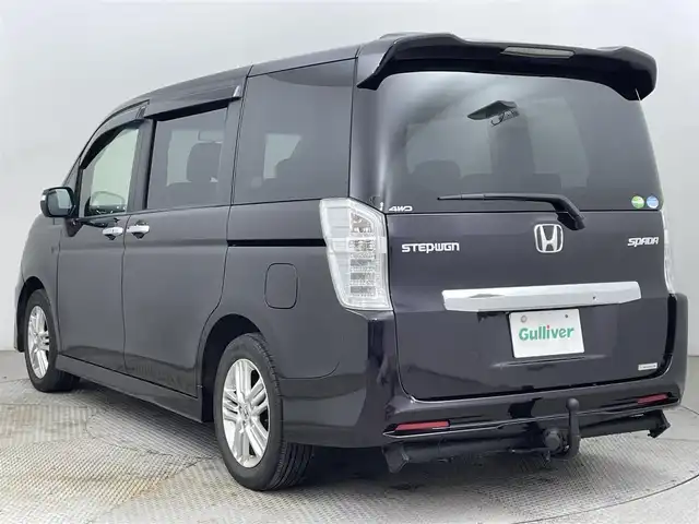ホンダ ステップワゴン スパーダ Z 道央・札幌 2013(平25)年 6.1万km プレミアムコスミックバイオレットパール ・４WD/・寒冷地仕様/・純正ナビゲーション（VXM-135VFNi）/　ＣＤ/ＤＶＤ/フルセグ/ＳＤ/ＢＴ/・純正ビルトインETC/・バックカメラ/・ヒッチメンバー/・両側パワースライドドア/・横滑り防止装置/・HIDヘッドライト/・オートライト/・パドルシフト/・ミラーヒーター/・ドアバイザー/・ワイパーデアイサー/・スマートキー/・スペアキー1本/・社外フロアマット（前席欠品）/・純正AW16インチ/・保証書あり/・取説あり