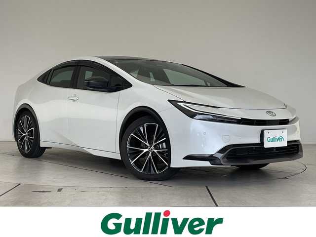 トヨタ プリウス Z 愛知県 2024(令6)年 1.5万km プラチナホワイトパールマイカ 純正12.4型ディズプレイオーディオナビ/全方位カメラ/ガラスルーフ/レーダークルーズコントロール/シートヒーター/エアシート/バッグカメラ/電気リアゲート/パワーシート/コーナーセンサー/純正アルミホイール/ETC2.0/ブラインドスポットモニター/LEDヘッドライト/ステアリングヒーター/インテリジェントミラー/オートマチックハイビーム/衝突軽減システム/フルセグ/ステアリングスイッチ/スマートキー/プッシュスタート